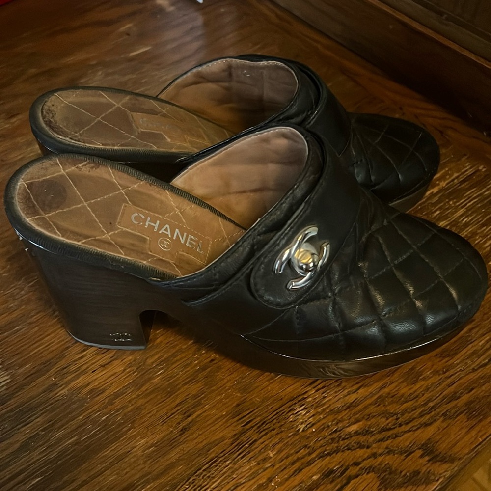 Chanel black leather clogs